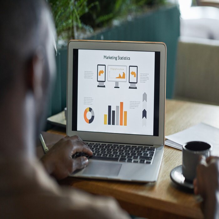businessman-analyzing-marketing-statistics-2023-11-27-04-55-38-utc (1)