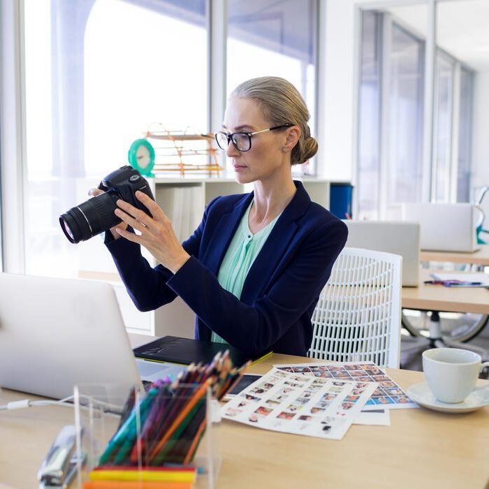female-executive-reviewing-captured-photograph-at-2023-11-27-05-09-43-utc (2)