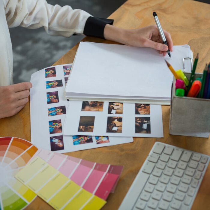 female-graphic-designer-working-at-desk-2023-11-27-05-11-16-utc (1)