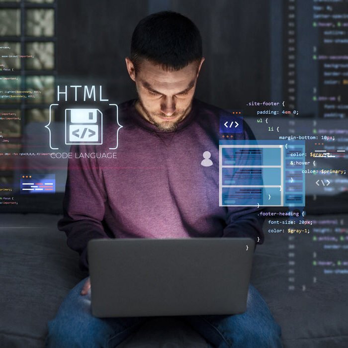 medium-shot-man-working-laptop (1)