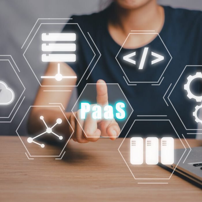 paas-platform-as-service-womaan-hand-touching-paas-icon-vr-screen-desk-background-internet-technology-development-concept (1)
